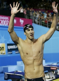 Michael Phelps Photo USA's Michael Phelps waves to the cheering crowds after setting a new world record in the men's 400m Individual Medley final at the World Swimming Championships in Melbourne, Australia, Sunday, April 1, 2007. His record breaking time was 4 minutes and 06.22 seconds. (AP Photo/Rob Griffith)
