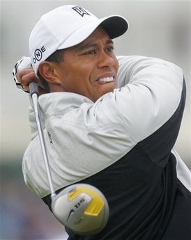 Tiger Woods Leads 2007 British Open Tiger Woods of the United States plays from the 2nd tee during the first round of the British Open Golf Championship at Carnoustie, Scotland, Thursday July 19, 2007. (AP Photo/Alastair Grant)