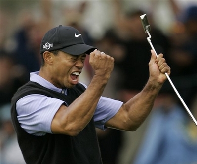 Tiger Woods Eagles 13th Hole U.S. Open Tiger Woods celebrates after making an eagle on the 13th hole during the third round of the US Open championship at Torrey Pines Golf Course on Saturday, June 14, 2008 in San Diego. (AP Photo/Charlie Riedel)