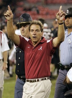 Alabama head coach Nick Saban gestures to the fans as he leaves the field after defeating Georgia 41-30 in an NCAA college football game in Athens, Ga., Saturday, Sept. 27, 2008. (AP Photo/John Bazemore)